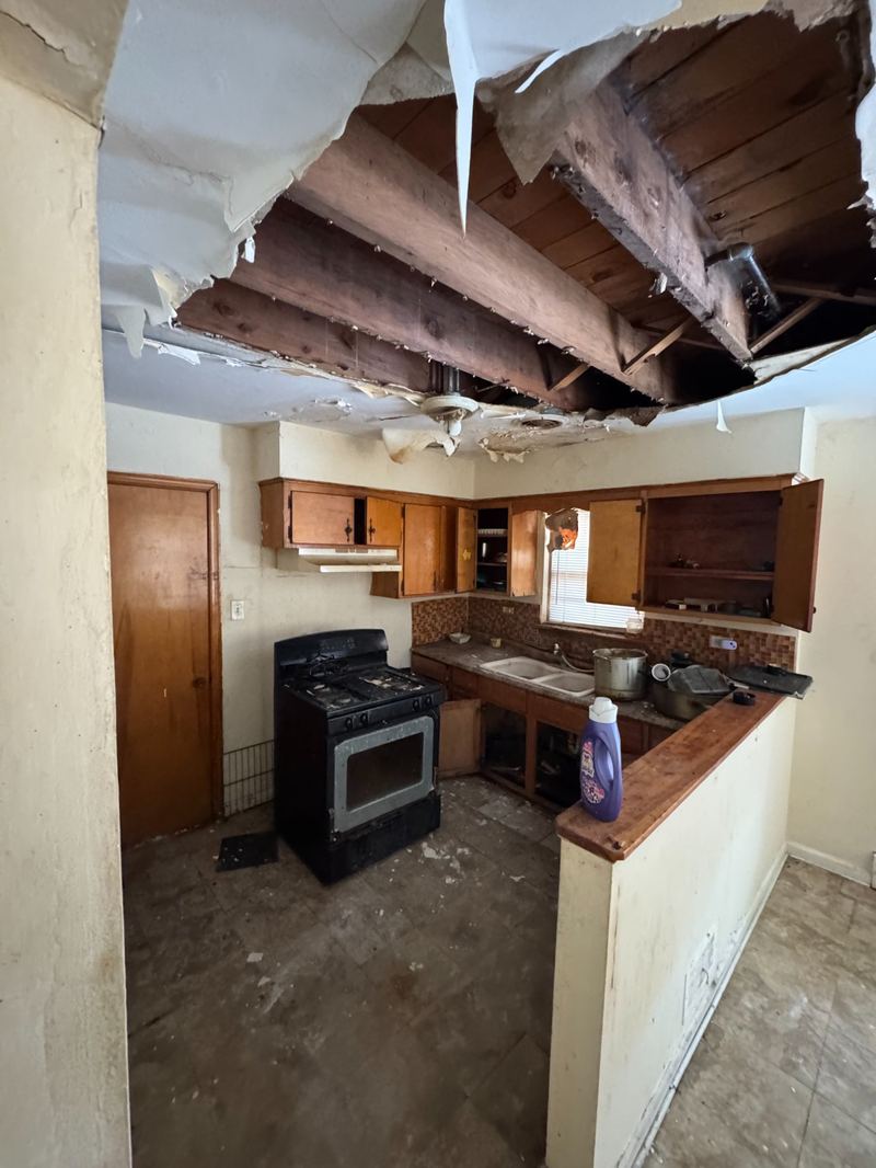 Kitchen with major damage - we buy houses as-is