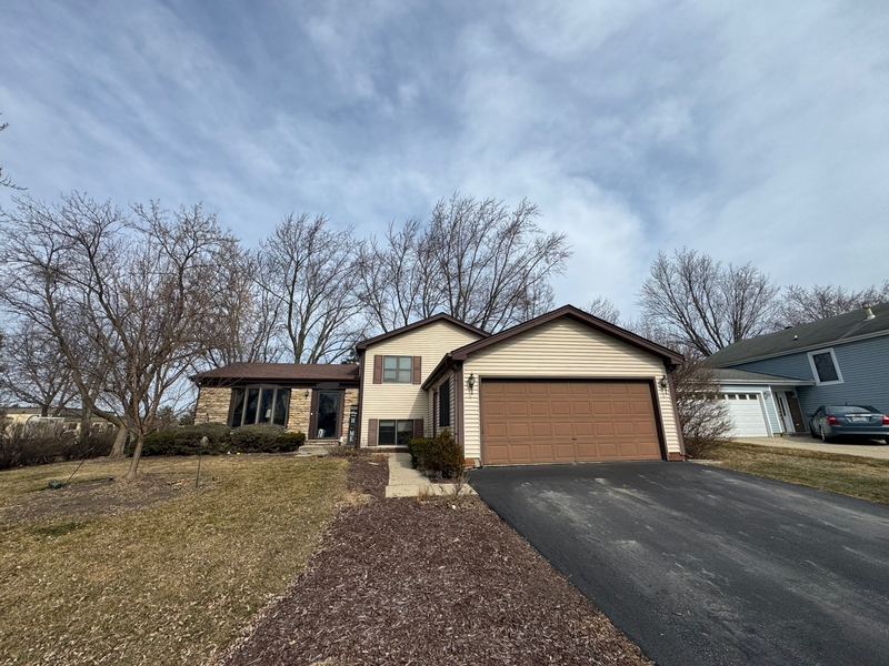 Suburban split-level home with garage